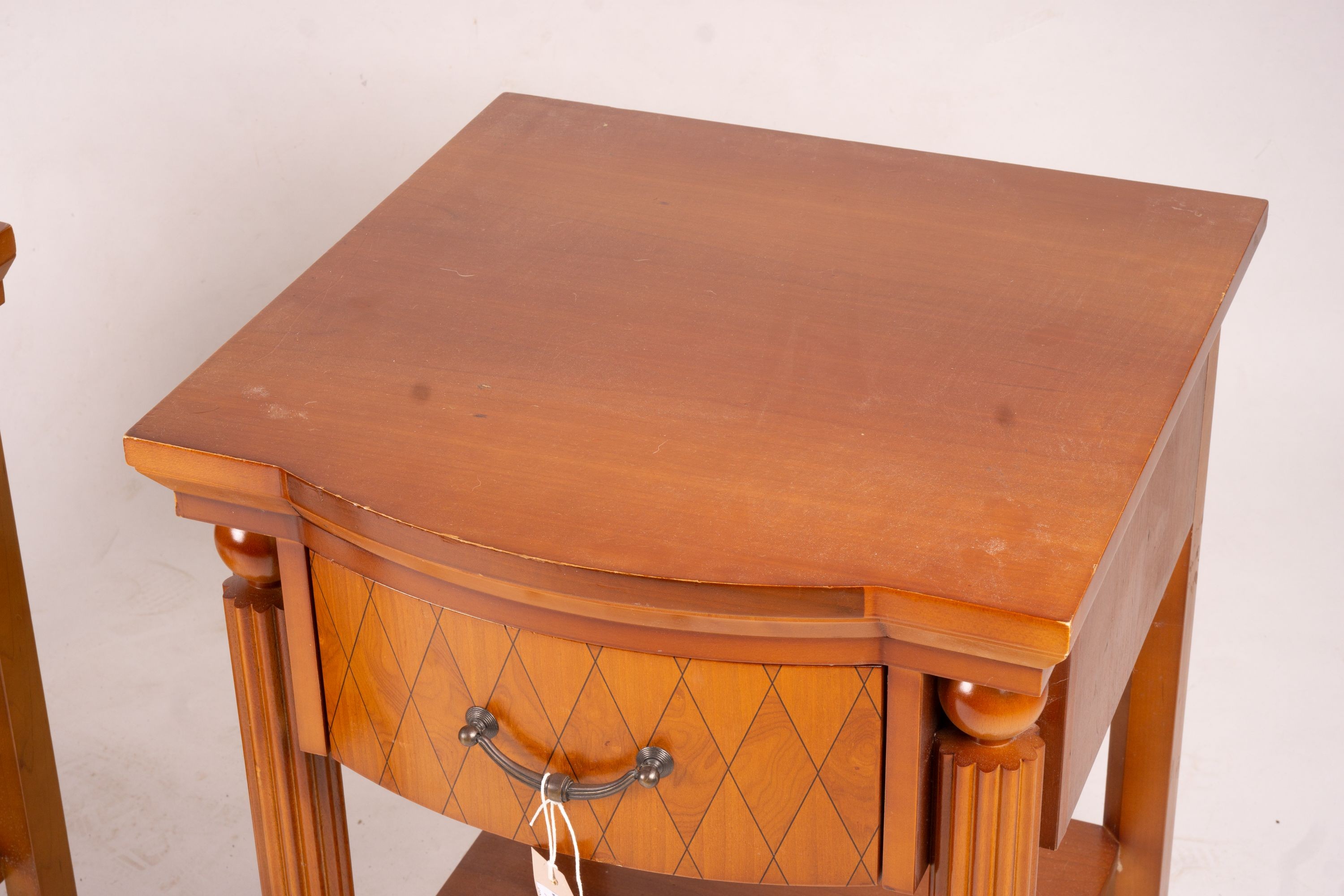 A pair of mahogany bowfront bedside cabinets, width 50cm, depth 50cm, height 62cm